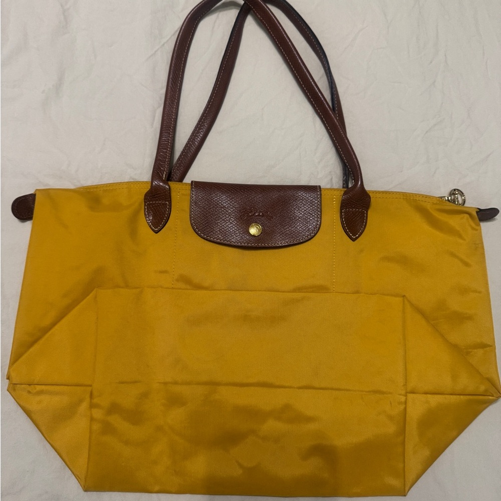 Longchamp mustard yellow tote with brown leather trim